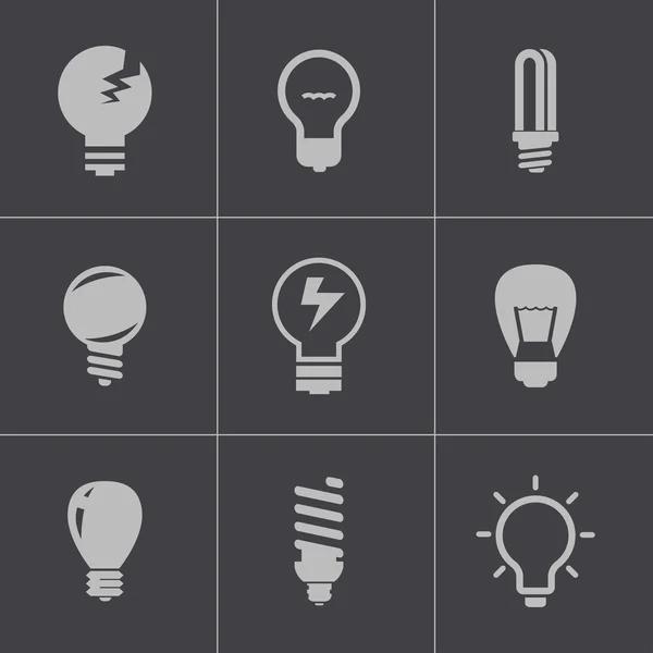 Ensemble d'icônes d'ampoules noires vectorielles — Image vectorielle
