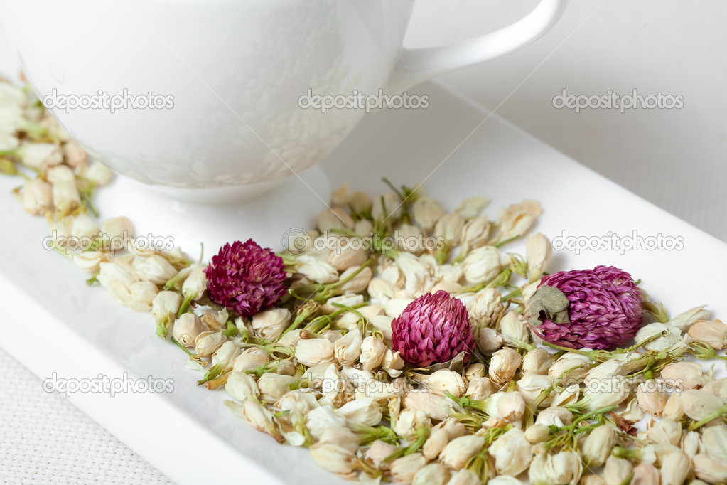 White Tea Cup and Dry Flowers
