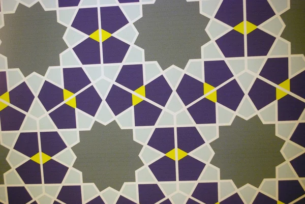 Azulejos decorativos de pared con patrones geométricos azul, gris, amarillo y blanco Imágenes de stock libres de derechos