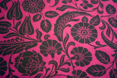 Red and gold gift wrapping with floral patterns