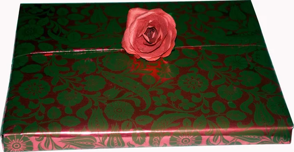 Red and gold gift wrapping with floral patterns