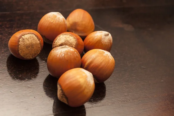 Scattered hazelnuts — Stock Photo, Image