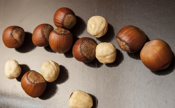 Scattered hazelnuts — Stock Photo, Image