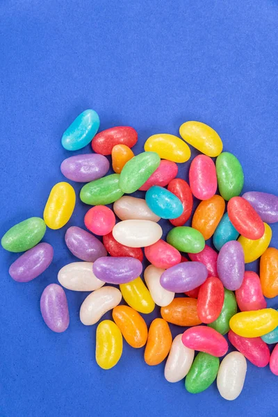 Several Jelly Beans Blue Background — Stock Photo, Image