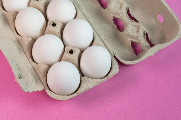 Eggs on the pink background