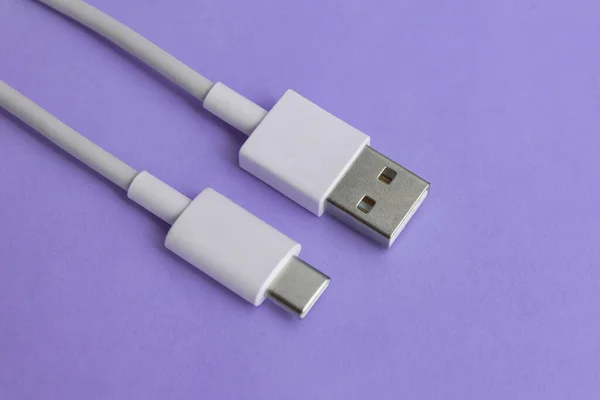 USB cable type C over blue background