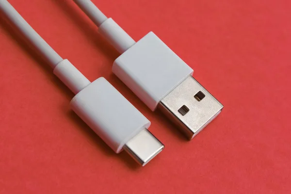 USB cable type C over pink background