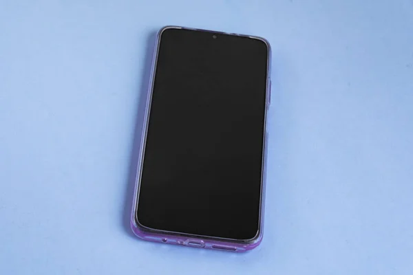 Mobiltelefon Över Färgglada Bakgrund — Stockfoto