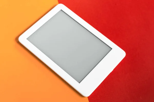Ebook Reader Yellow Red Background — Stock Photo, Image