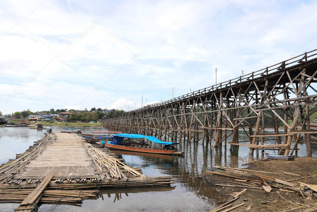Mon Bridge crossing Songkalia River, the Thailand's longest wooden bridge, Sangkhla Buri District in Kanchanaburi, Thailand