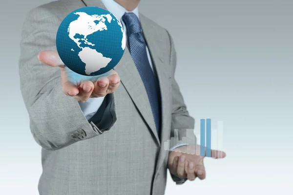 Businessman hand shows success and globe — Stock Photo, Image