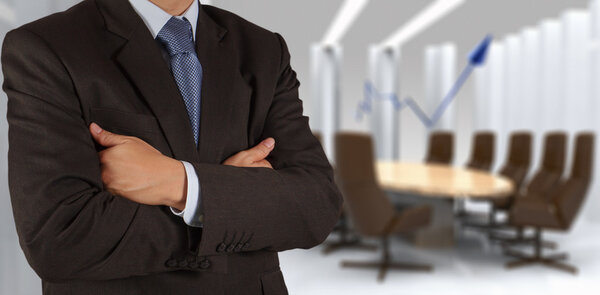 business man hand drawing a pie chart
