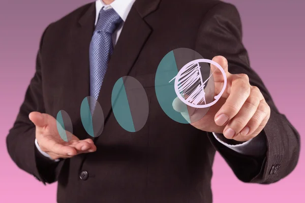 Businessman hand drawing a pie chart — Stock Photo, Image