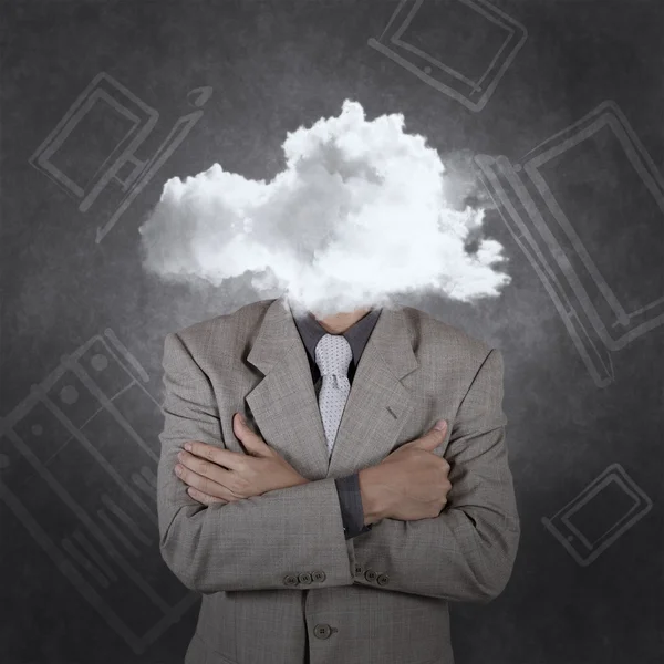 Businessman with head in the clouds — Stock Photo, Image