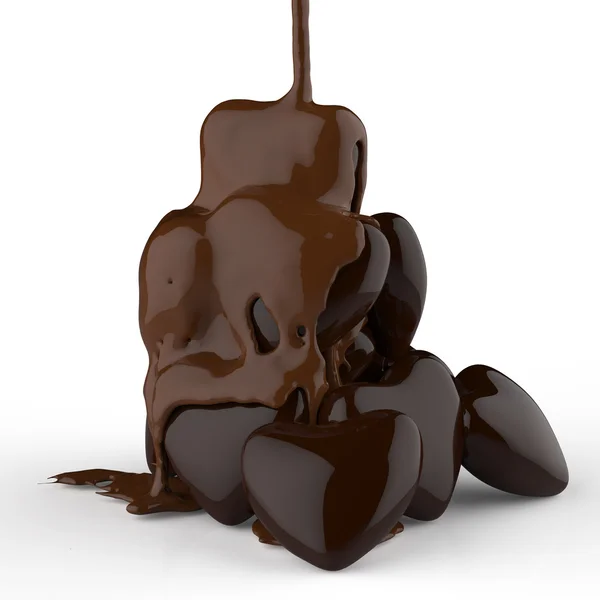 Закрыть шоколадный сироп, протекающий над символом формы сердца — стоковое фото