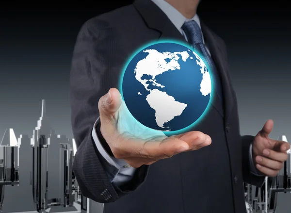 A glowing earth globe in his hands — Stock Photo, Image