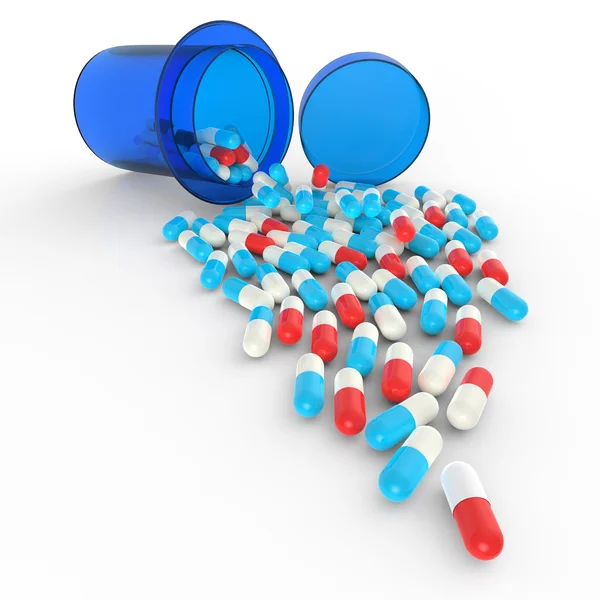 Pills spilling out of pill bottle on white — Stock Photo, Image