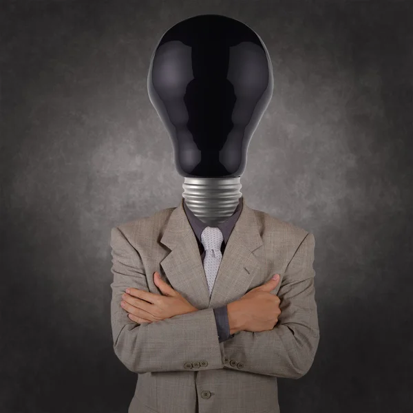 Empresário com cabeça de lâmpada preta — Fotografia de Stock