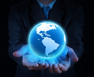 Elinde parlayan bir dünya küresi tutuyordu.