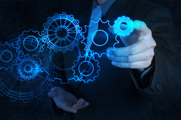 Businessman hand show gear to success