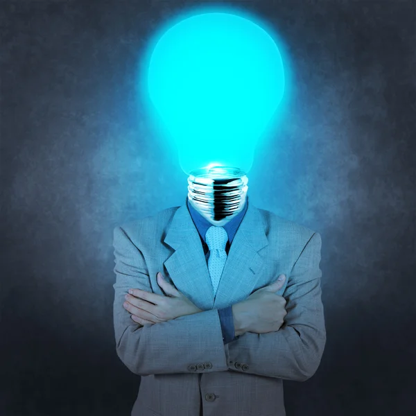 Businessman with lamp-head — Stock Photo, Image
