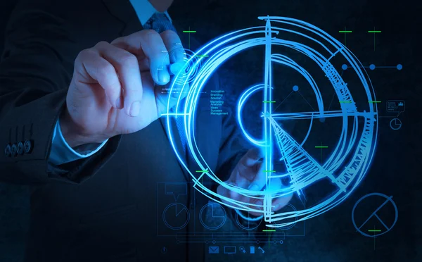 Business man hand drawing a chart — стоковое фото