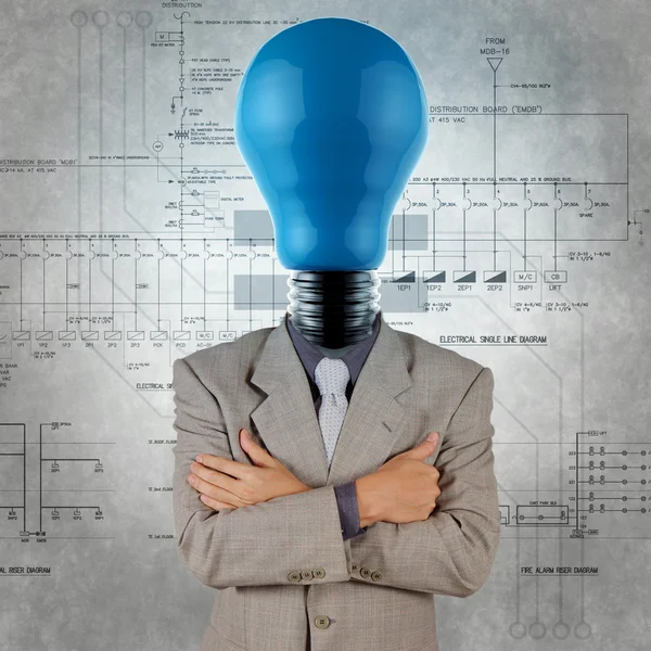 Smart engineer with blue lightbulb head with electrical diagram — Stock Photo, Image