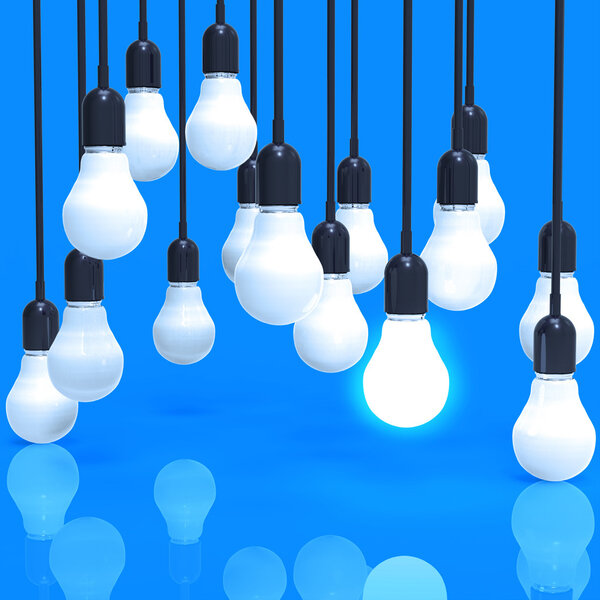 creative idea and leadership concept light bulb on blue