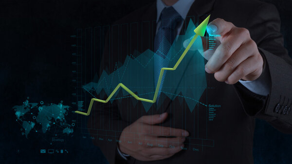 business man hand working with new modern computer and business s
