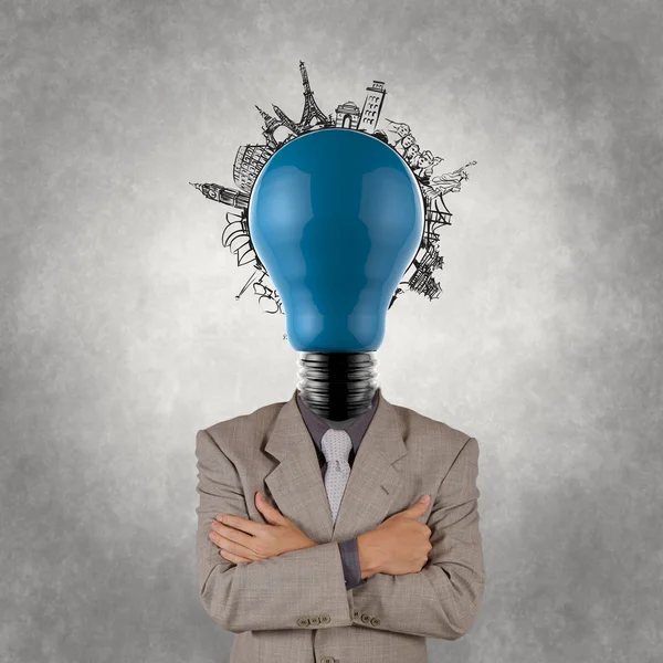 Businessman and light bulb head and traveling around the world — Stock Photo, Image