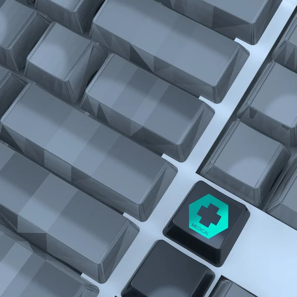 灰色のコンピューターのキーボードのボタン上の医療アイコン — ストック写真