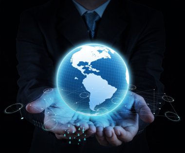 Elinde parlayan bir dünya küresi tutuyordu.