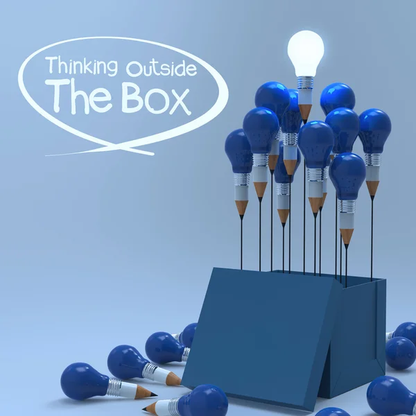 図面のアイデアの鉛筆と、ボックスの外側の電球コンセプト — ストック写真