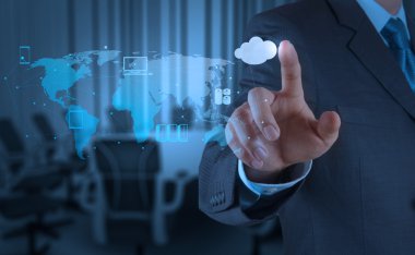 Businessman working with a Cloud Computing diagram on the new co