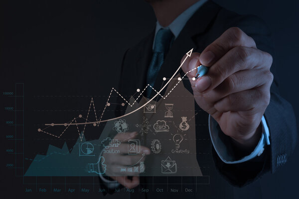 business man hand working with new modern computer and business s
