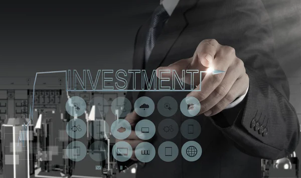 Businessman pointing to investment concept — Stock Photo, Image