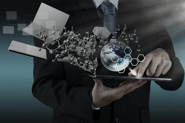 Businessman shows modern technology — Stock Photo, Image