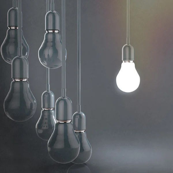 Ideia criativa e conceito de liderança lâmpada — Fotografia de Stock
