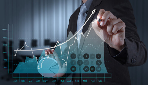 business man hand working with new modern computer and business s
