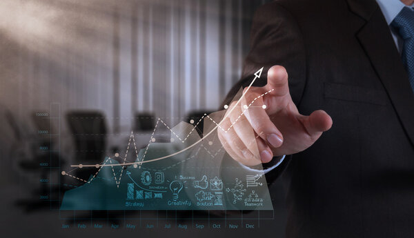 business man hand working with new modern computer and business s
