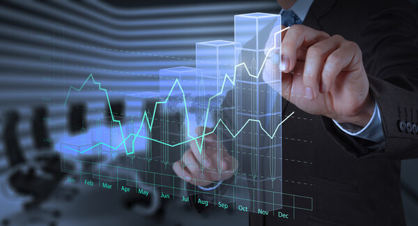 business man hand working with new modern computer and business s
