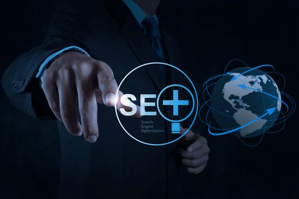 Businessman hand showing search engine optimization SEO — Stock Photo, Image