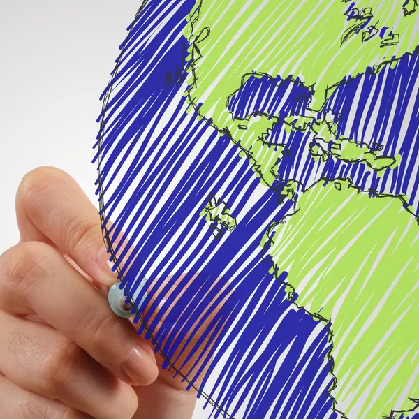 Female hand drawing earth — Stock Photo, Image