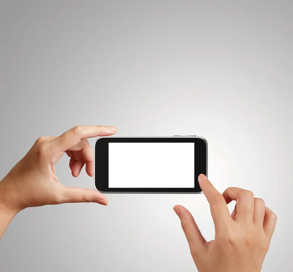 Woman hand holding the phone tablet touch computer gadget — Stok fotoğraf