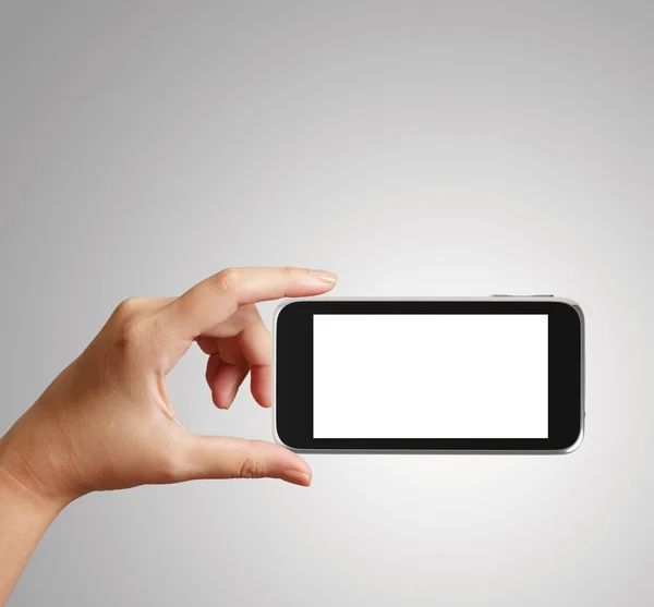 Woman hand holding the phone tablet touch computer gadget — Stockfoto