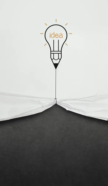 Pencil lightbulb draw rope open wrinkled paper show blank black — Stock Photo, Image