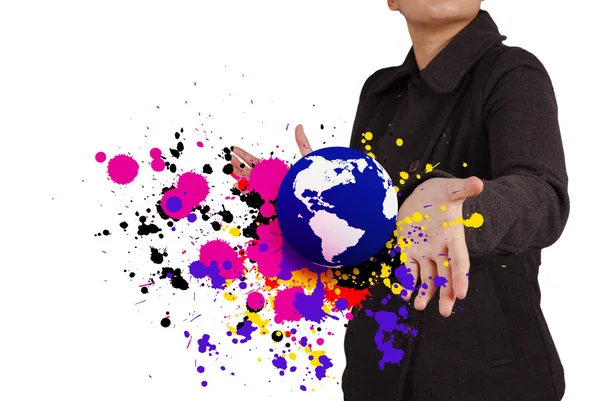 Businesswoman shows the earth and splash colors — Stock Photo, Image