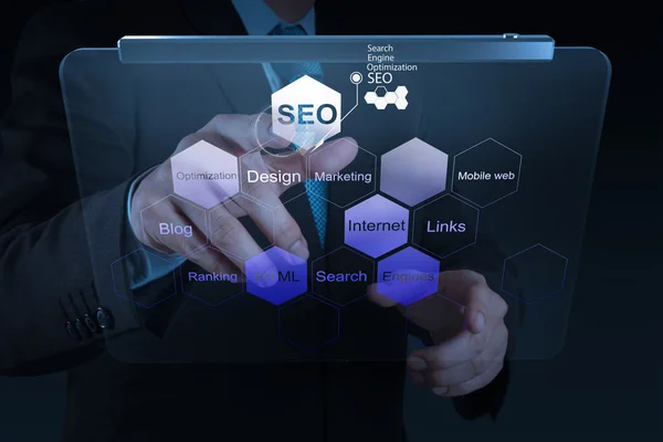 Businessman hand showing search engine optimization SEO — Stock Photo, Image