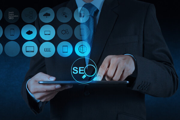 businessman hand showing search engine optimization SEO