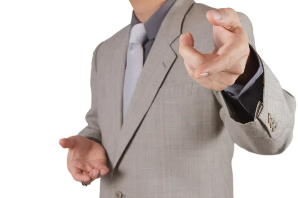 Businessman pressing an imaginary button on virtual screen — Stock Photo, Image